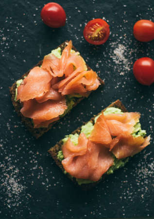 smoked salmon sandwich - healthy snacks and homemade food styled concept