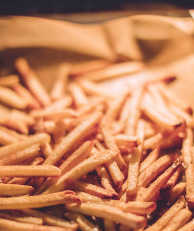 just cooked french fries in the oven - rustic food and homemade cooking styled concept, elegant visualsの写真素材