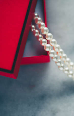 wonderful pearls in a red gift box, luxe present - jewellery and luxury gift for her styled concept, elegant visualsの写真素材
