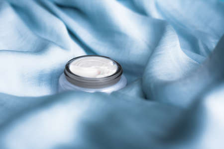 luxury face cream on soft silk - anti-aging, cosmetic and beauty styled concept, elegant visuals