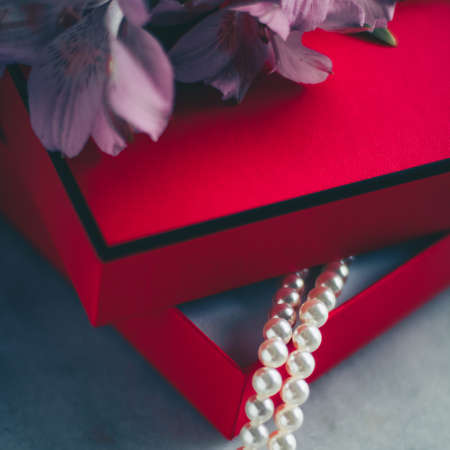 wonderful pearls in a red gift box, luxe present - jewellery and luxury gift for her styled concept, elegant visualsの写真素材