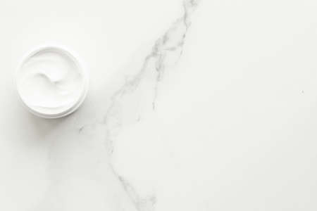 All-natural emulsion cream on marble, flatlay - skincare and body care, luxury spa and clean cosmetic concept. Time for organic beauty treatmentの写真素材