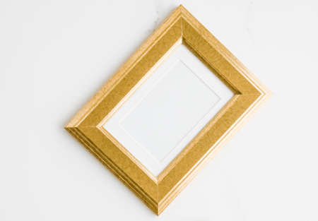 Golden photo frame on marble, flatlay - modern feminine, artwork mock up, luxury design concept....