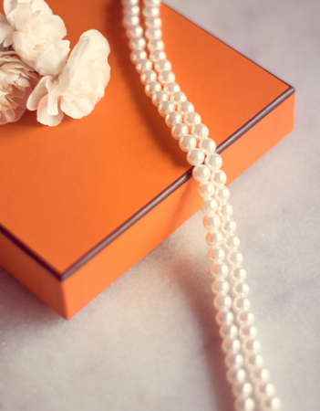 Present box and flowers for her - Mother's day ideas, happy giving and holiday inspiration concept. The perfect gift for momの写真素材