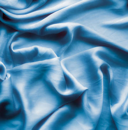 Blue soft silk waves, flatlay - elegant fabric textures, abstract backgrounds and modern pastel colours concept. Feel the touch of luxuryの写真素材