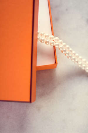Chic pearl jewellery in a present box - Valentine's day ideas, luxury shopping and holiday inspiration concept. The perfect gift for herの写真素材