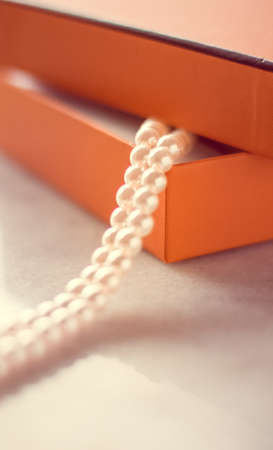 Chic pearl jewellery in a present box - Valentine's day ideas, luxury shopping and holiday inspiration concept. The perfect gift for herの写真素材