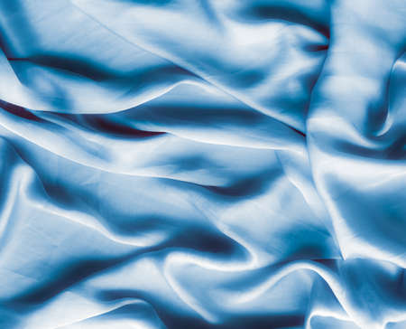 Blue soft silk waves, flatlay - elegant fabric textures, abstract backgrounds and modern pastel colours concept. Feel the touch of luxuryの写真素材