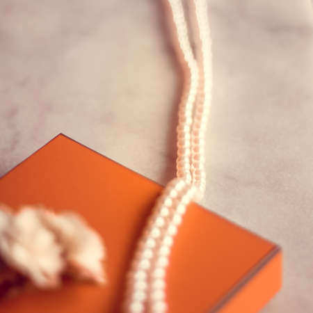 Present box and flowers for her - Mother's day ideas, happy giving and holiday inspiration concept. The perfect gift for momの写真素材