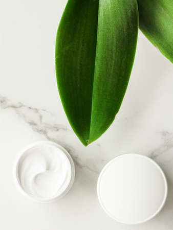 Anti-age cream products on marble, flatlay - skincare and body care, luxury spa and clean cosmetic...