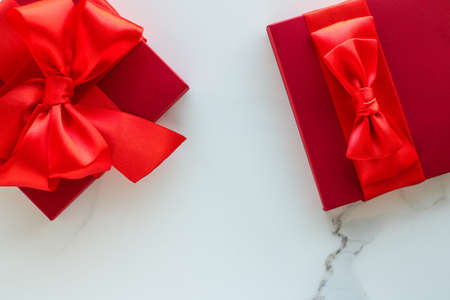 Romantic celebration, lifestyle and birthday present concept - Luxury red holiday gifts on marbleの写真素材