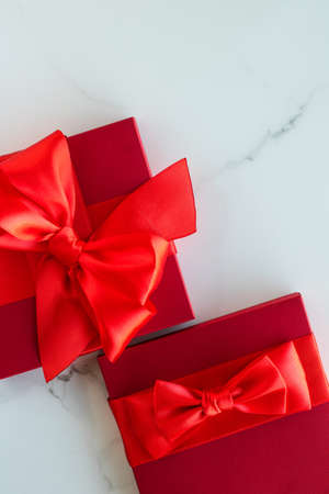Romantic celebration, lifestyle and birthday present concept - Luxury red holiday gifts on marbleの写真素材