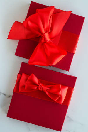 Romantic celebration, lifestyle and birthday present concept - Luxury red holiday gifts on marbleの写真素材