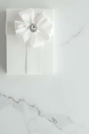 Romantic celebration, lifestyle and holiday present concept - Luxury wedding gifts on marbleの写真素材