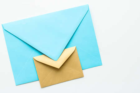 Communication, newsletter and business concept - Envelopes on marble background, messageの写真素材