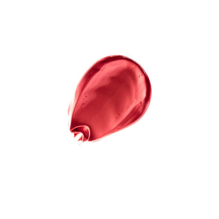 Cosmetic products, fashion and beauty concept - Lipstick smudge isolated on white background, art of make-upの写真素材
