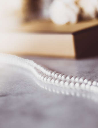 Valentine's day ideas, luxury shopping and holiday inspiration concept - Pearl jewellery in a vintage golden gift boxの写真素材