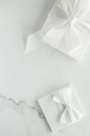 Romantic celebration, lifestyle and holiday present concept - Luxury wedding gifts on marbleの写真素材
