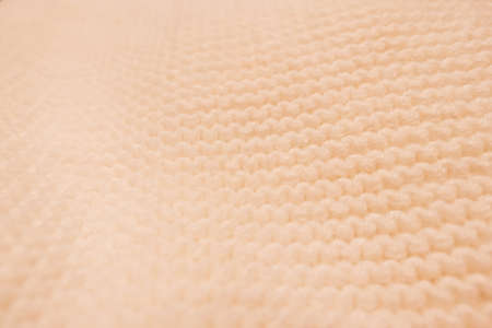 Knitwear, fabric textures and rustic lifestyle concept - Knitted winter clothes