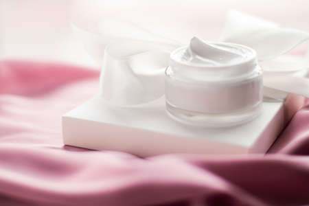 Beauty, cosmetics and skincare styled concept - Luxury moisturizing cream and a white gift boxの写真素材