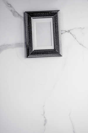 Photo album, artwork mock up, vintage design concept - Black wooden frame on marble, flatlay