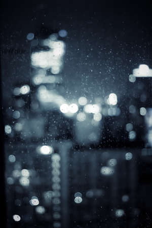 Big metropolitan city lights at night, blurry background - night life, abstract background and...