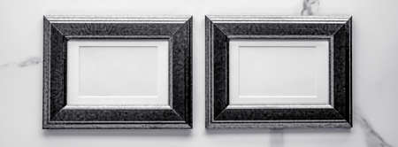 Photo album, artwork mock up, vintage design concept - Black wooden frame on marble, flatlayの写真素材
