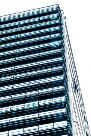 Business, city lifestyle and futuristic design concept - Contemporary office building in financial...