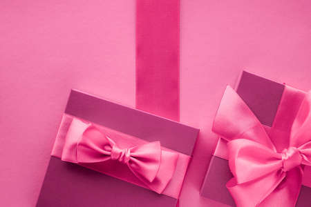 Baby shower girl, celebration, present concept - Pink gift boxes, feminine style flatlay background