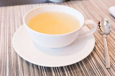 Healthy nutrition, relax and detox concept - Green herbal tea in a restaurant, five o'clockの写真素材