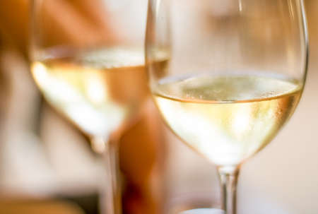 Winery, fine dining and celebration concept - French white wine in a restaurant in Paris, travel...