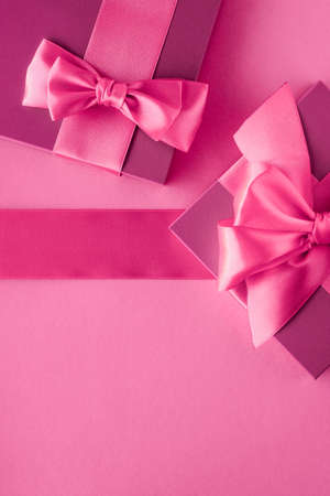 Baby shower girl, celebration, present concept - Pink gift boxes, feminine style flatlay background