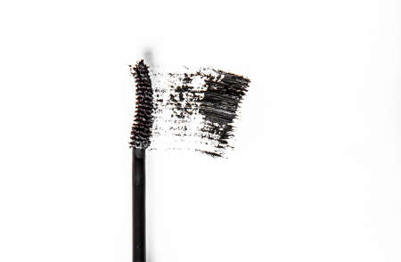 Beauty texture, cosmetic product and art of make-up concept - Black mascara brush stroke close-up isolated on white backgroundの写真素材