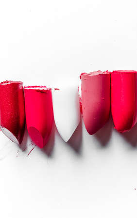 Beauty texture, cosmetic product and art of make-up concept - Cutted lipstick close-up isolated on white backgroundの写真素材
