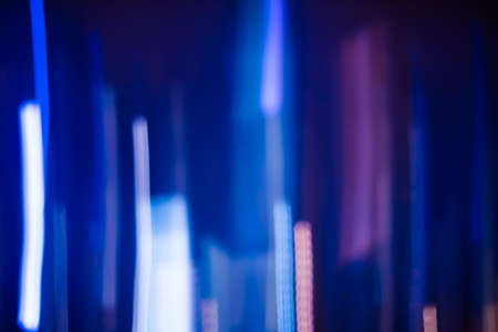 Technology, defocused textures and futuristic design concept - Neon lights background, abstract lines in motionの写真素材
