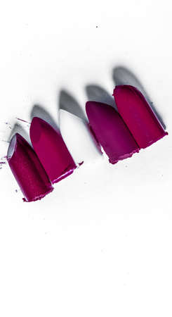 Beauty texture, cosmetic product and art of make-up concept - Cutted lipstick close-up isolated on white backgroundの写真素材