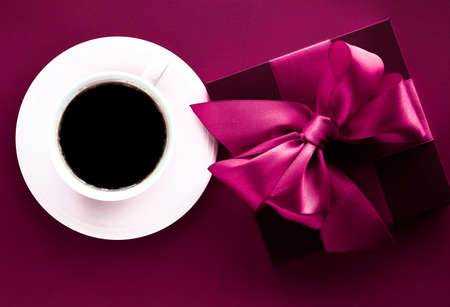Romantic present, cafe backdrop and drink concept - Coffee cup and luxury gift box flatlay backgroundの写真素材