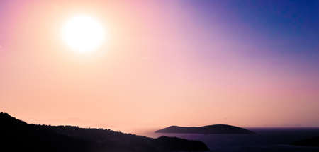 Nature, twilight and vintage beach holiday concept - Summer sunset at the Mediterranean sea coast,...