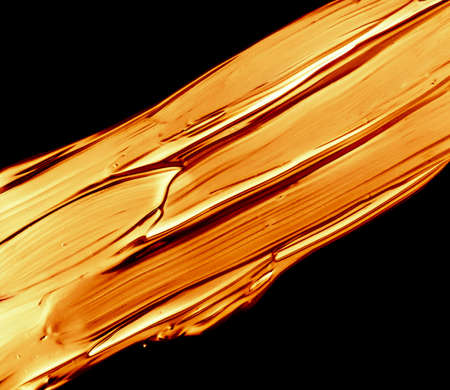 Art abstract, cosmetic product and hand painted design concept - Golden paint brush stroke texture...