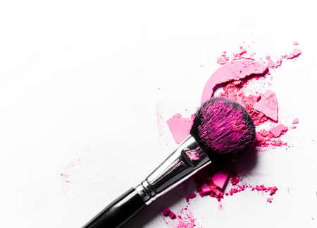 Beauty texture, cosmetic product and art of make-up concept - Brush with crushed eyeshadow and...