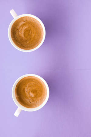Breakfast, drinks and cafe menu concept - Coffee cup on purple background, top view flatlay