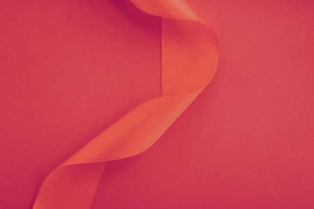 Branding, holidays and luxe brands concept - Abstract curly silk ribbon on rose background, exclusive luxury brand design for holiday sale product promotion and glamour art invitation card backdropの写真素材