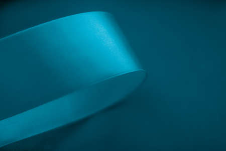 Branding, holidays and luxe brands concept - Abstract silk ribbon on aqua blue background, exclusive luxury brand design for holiday sale product promotion and glamour art invitation card backdropの写真素材