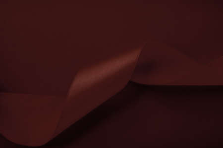 Branding, holidays and luxe brands concept - Abstract silk ribbon on chocolate background, exclusive...