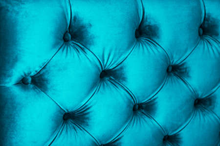 Furniture design, classic interior and royal vintage material concept - Blue luxury velour quilted sofa upholstery with buttons, elegant home decor texture and backgroundの写真素材