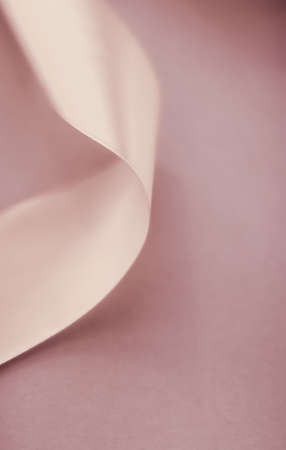 Branding, holidays and luxe brands concept - Abstract curly silk ribbon on pastel background, exclusive luxury brand design for holiday sale product promotion and glamour art invitation card backdropの写真素材