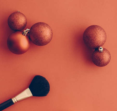 Cosmetic branding, fashion blog cover and girly glamour concept - Make-up and cosmetics product set for beauty brand Christmas sale promotion, vintage orange flatlay background as holiday designの写真素材