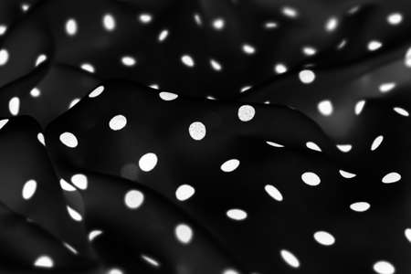 Fashion design, interior decor and classic material concept - Vintage polka dot textile background texture, white dots on black luxury fabric design patternの写真素材