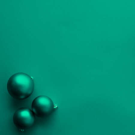 Gift decor, New Years Eve and happy celebration concept - Christmas baubles on green flatlay...