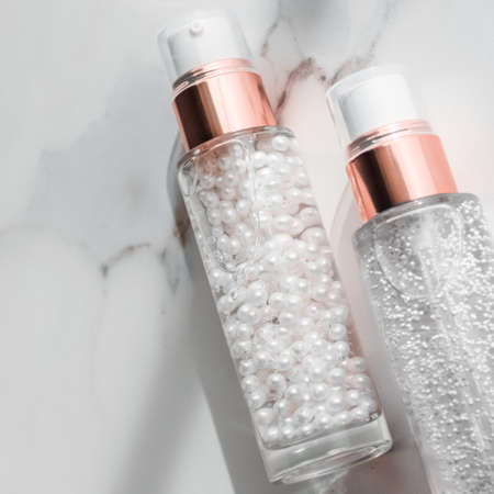 Cosmetic branding, packaging and make-up concept - Skin care serum and gel bottle, moisturizing...